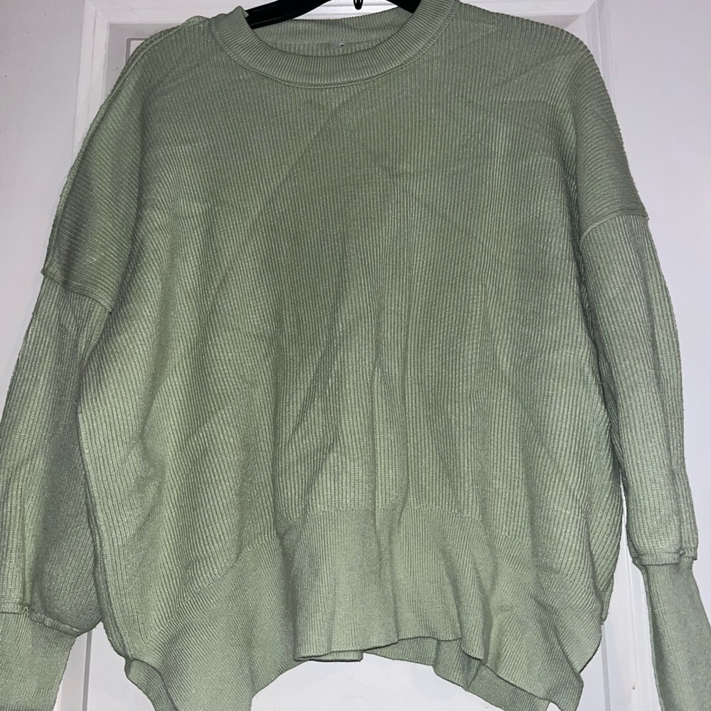 green sweater